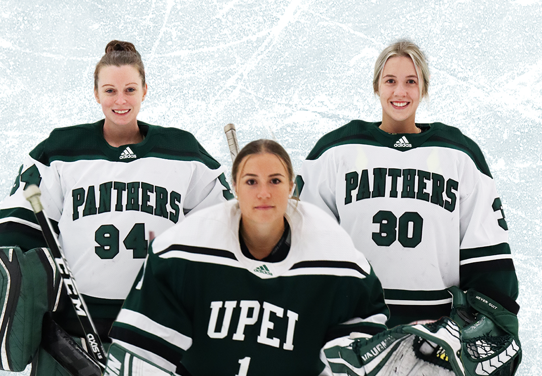 3 Female UPEI goaltenders in white and green uniform and hockey gear